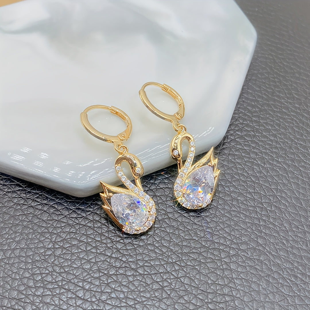 Golden Tone Swan Dangle Earrings