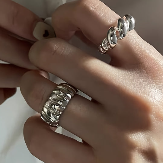 Two Simple Geometric Round Rings